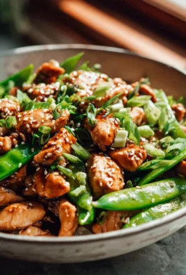 Leckeres Honig-Knoblauch-Hähnchen-Stir Fry mit Zuckererbsen